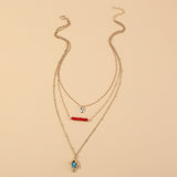 Vintage Turquoise Pendant With Multiple Necklaces And Little Fortunella Venosa Corallite Necklace